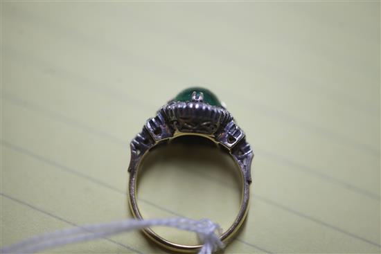 A yellow metal, cabochon emerald and white sapphire? cluster ring, size K.